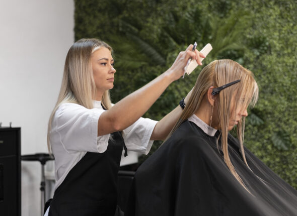 woman-getting-her-hair-cut-beauty-salon (1)
