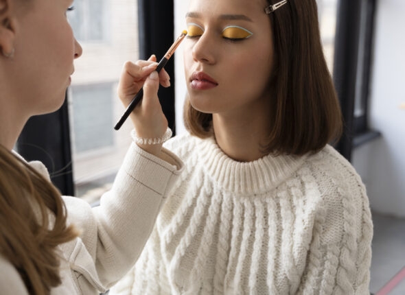 woman-doing-eye-make-up-close-up